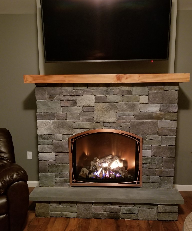 Mendota FV34 Gas Fireplace. Orchard Blend New England Ledgestone Veneer.